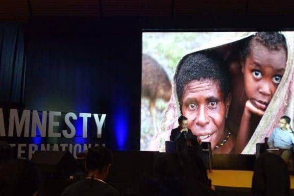 (Ilustrasi situasi pelanggaran HAM di Papua) IDN Times/Helmi Shemi