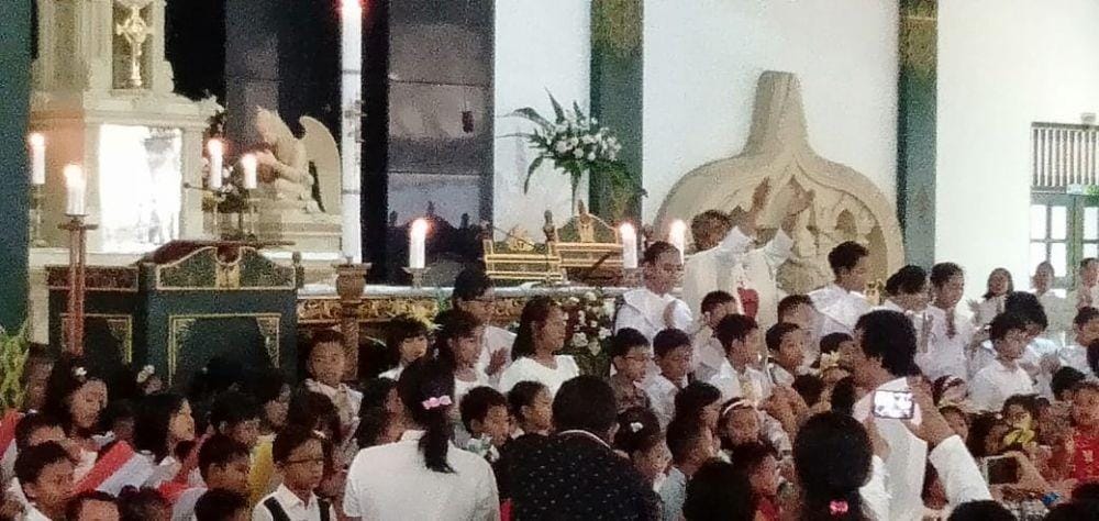 Ilustrasi misa Natal anak-anak di Gereja HKTY Ganjuran. IDN Times/Daruwaskita