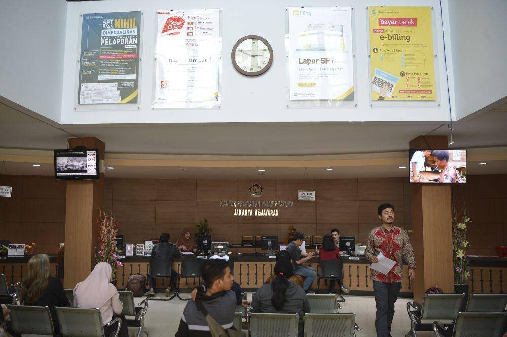 Ilustrasi kegiatan pembayaran pajak. ANTARA FOTO/Nova Wahyudi