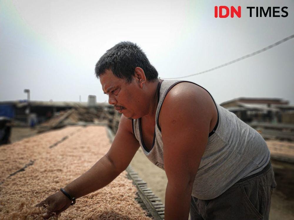 IDN Times/Oji,Pengusaha Pengasin Ikan (Axel Jo Harianja)