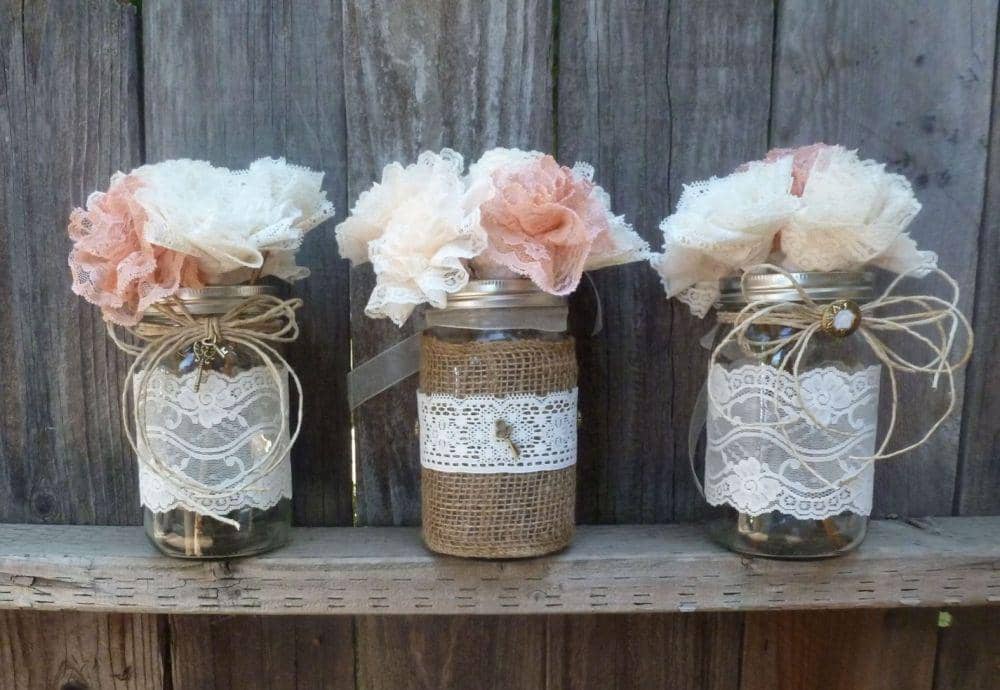 https://sawhd.com/15-awesome-diy-mason-jar-lights-to-make-your-home-look-beautiful/twine-and-cloth-mason-jar-centerpiece-09/