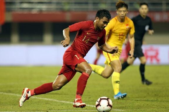 Aksi Asnawai Mangkualam ketika membela Timnas U-22 di laga uji coba lawan Tiongkok. pssi.org