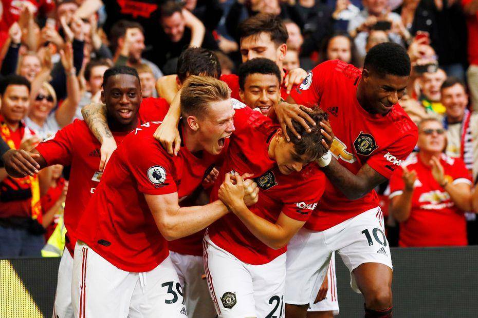Pemain Manchester United sedang meluapkan kegembiraan usai membuat gol. premierleague.com