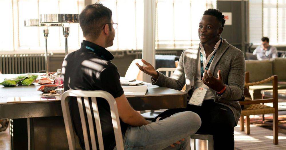 two men having conversation