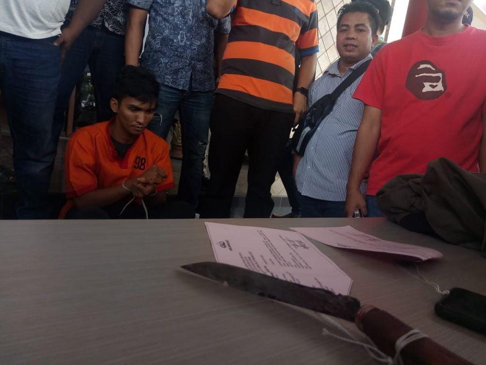 Tersangka tertunduk mengakui perbuatannya (IDN Times/istimewa)