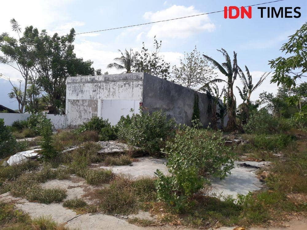 (Sisa bangunan rumah tak berpenghuni di Petobo, Palu, Sulawesi Tengah, terdampak likuefaksi) IDN Times/Margith Juita Damanik