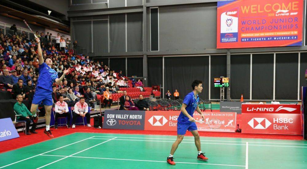 Ganda putra Tiongkok, Di Zi Jian/Wang Chan, di ajang YOC 2018. bwfbadminton.com