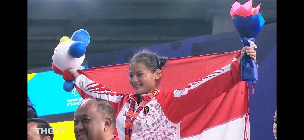 Atlet angkat besi putri, Windi Cantika Aisah. Twitter/@BadmintonTalk