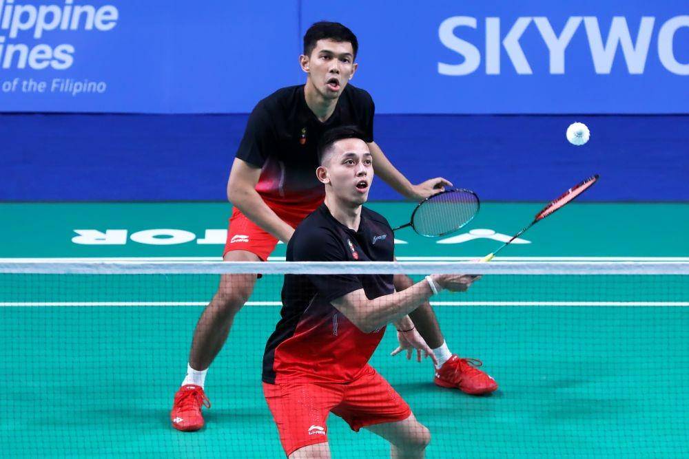 Fajar Alfian/Muhammad Rian Ardianto beraksi memperkuat tim beregu putra Indonesia dalam SEA Games 2019 (IDN Times/PBSI)