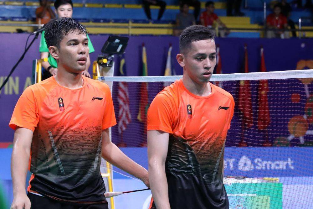 Fajar Alfian/Muhammad Rian Ardianto beraksi memperkuat tim beregu putra Indonesia dalam SEA Games 2019 (IDN Times/PBSI)