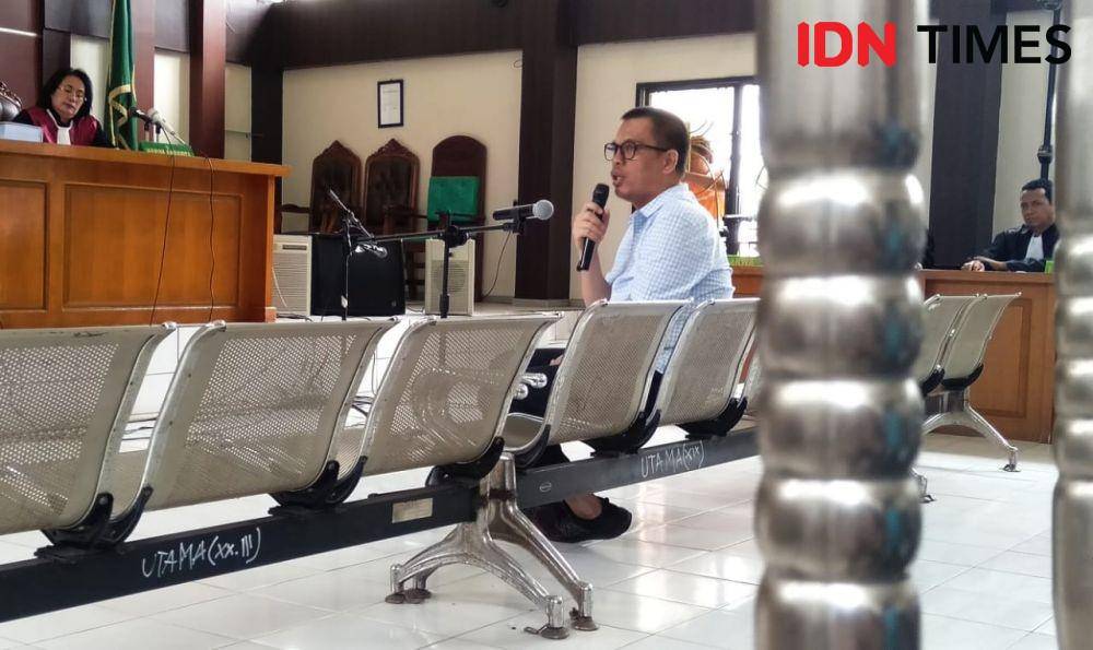 Robi Okta Fahlevi dalam sidang di PN Palembang (IDN Times/Sidratul Muntaha)