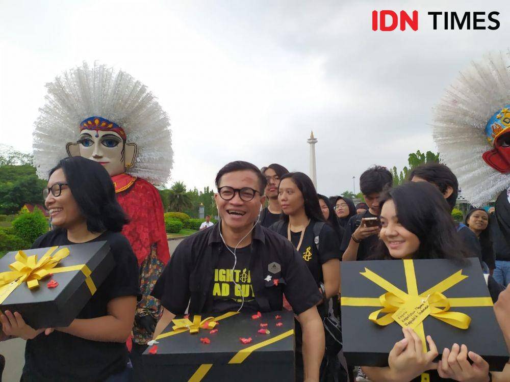 Amnesty International Indonesia menggelar aksi Pena dalam memperingati Hari HAM Sedunia. (IDN Times/Aldzah Fatimah Aditya)