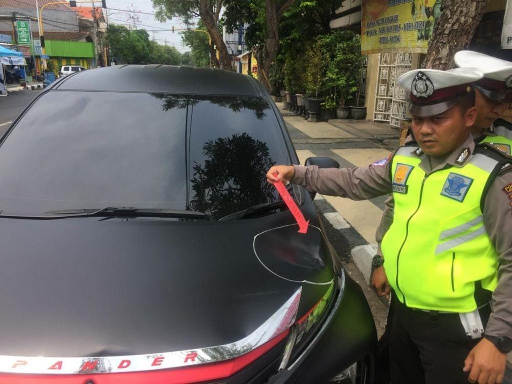 Petugas kepolisian Polres Lamongan melakukan olah TKP. IDN Times/Istimewa