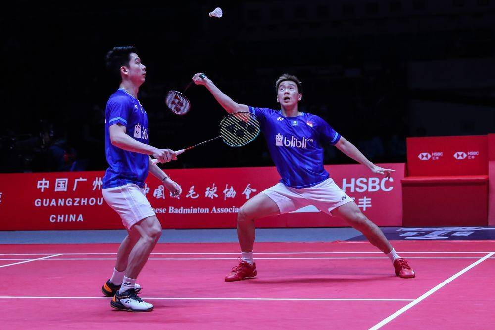 Kevin Sanjaya Sukamuljo/Marcus Fernaldi Gideon di putaran pertama penyisihan regu BWF World Tour Final 2019 (IDN Times/PBSI)