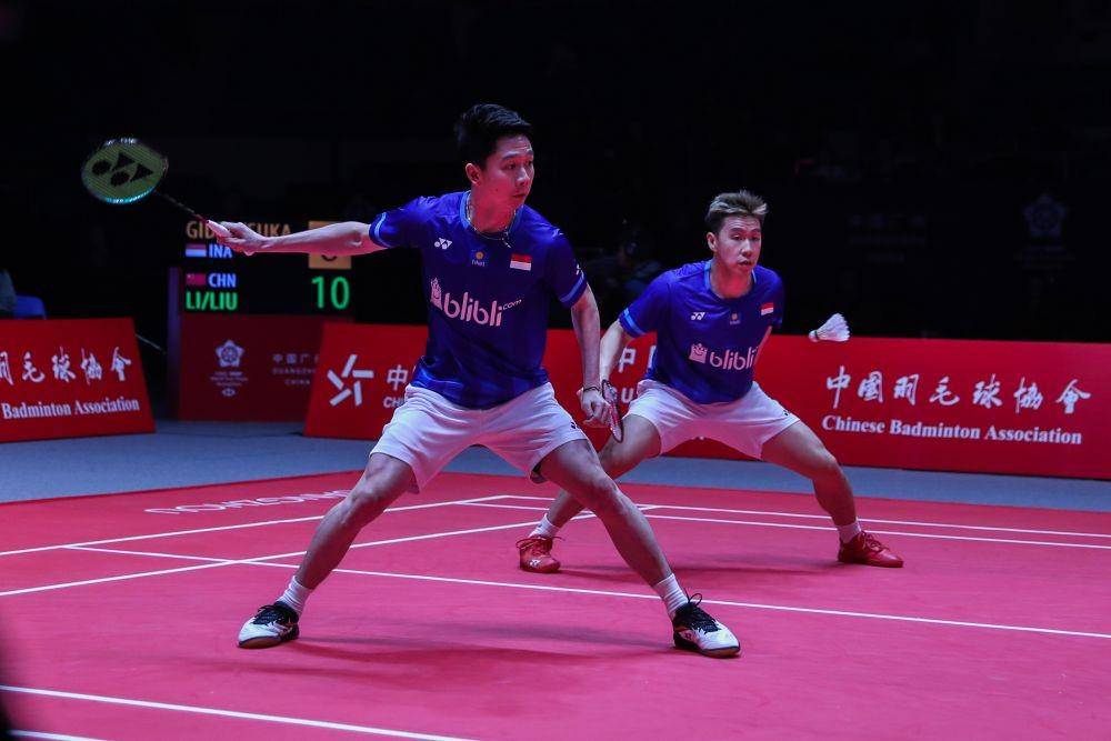 Kevin Sanjaya Sukamuljo/Marcus Fernaldi Gideon di putaran pertama penyisihan regu BWF World Tour Final 2019 (IDN Times/PBSI)