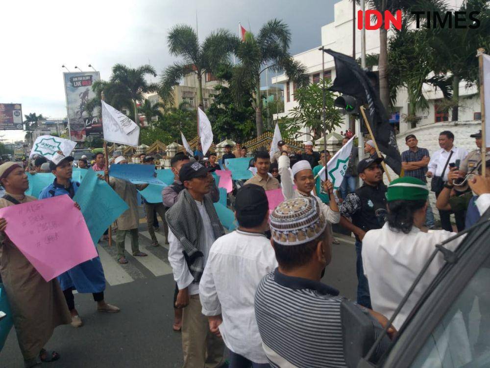Aksi solidaritas terhadap muslim Uighur di kota Binjai (IDN Times/Bambang Suhandoko)