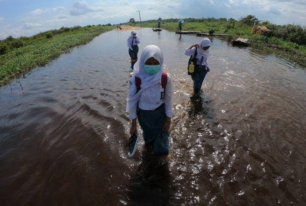 Ilustrasi bencana banjir. ANTARA FOTO/Wahdi Septiawan
