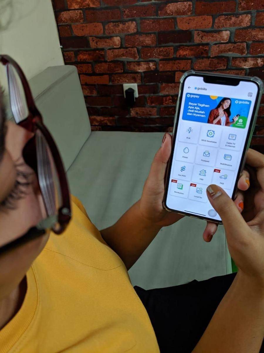 fitur GoBills pada aplikasi Gojek. Foto:ist